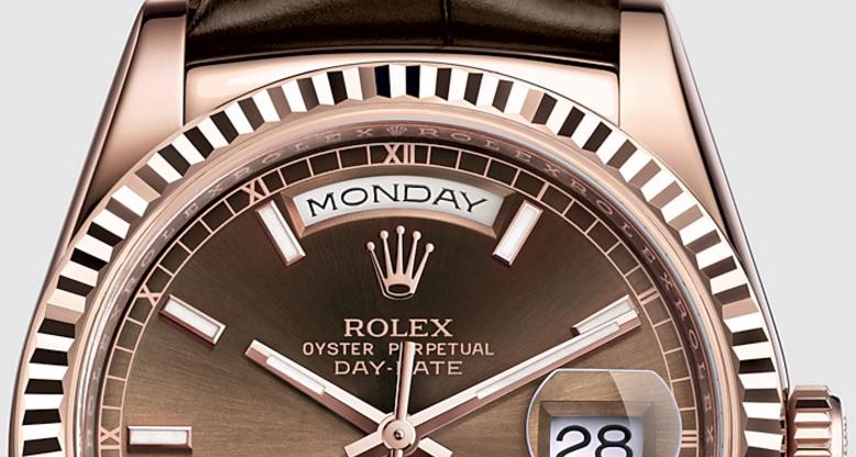 The luxury copy Rolex Day-Date 36 118135 watches are made from everose gold.