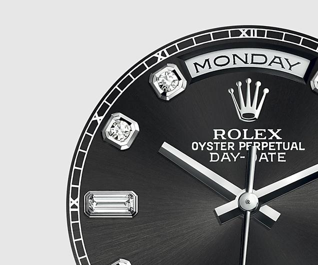 The 36 mm replica Rolex Day-Date 36 118239 watches have black dials.